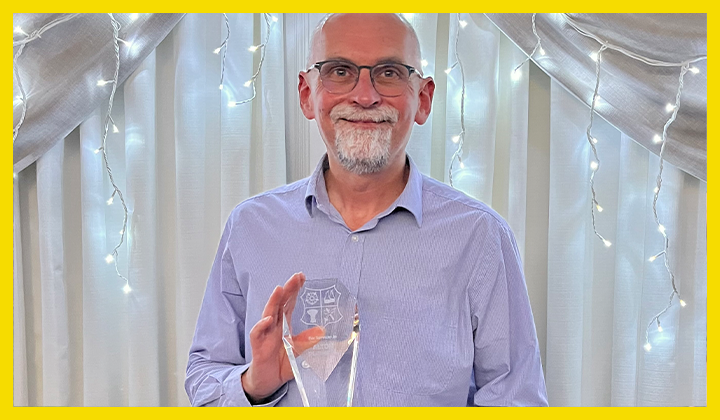 Philip Scrase Honoured with Life Membership Trophy